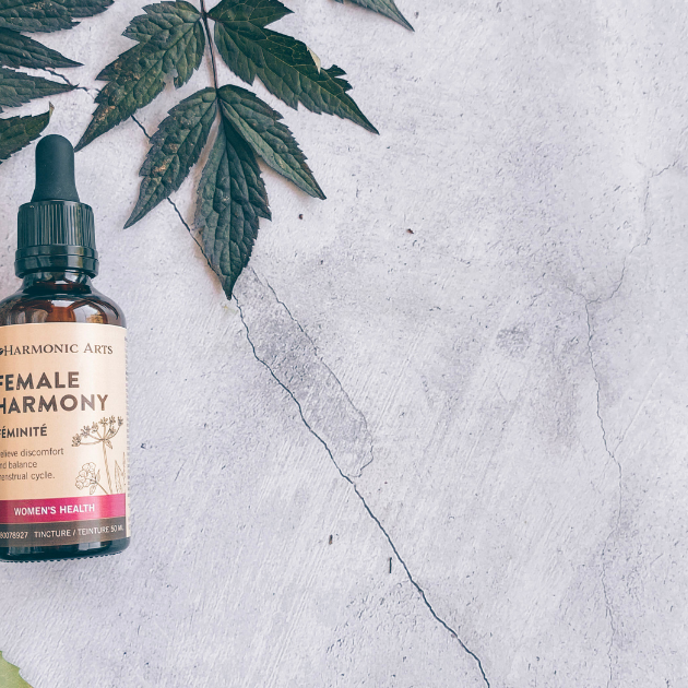 Herbs for Hormonal Harmony. Image features a lifestyle shot of Harmonic Arts' Female Harmony tincture blend next to the herbs mentioned within this blog.